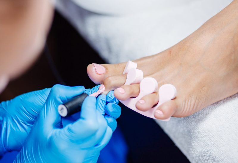 home-salon-pedicure-foot-care-treatment-nail-process-professional-pedicures-master-blue-gloves-apply-light-pink-gel-polish home-salon-pedicure-foot-care-treatment-nail-process-professional-pedicures-master-blue-gloves-apply-light-pink-gel-polish